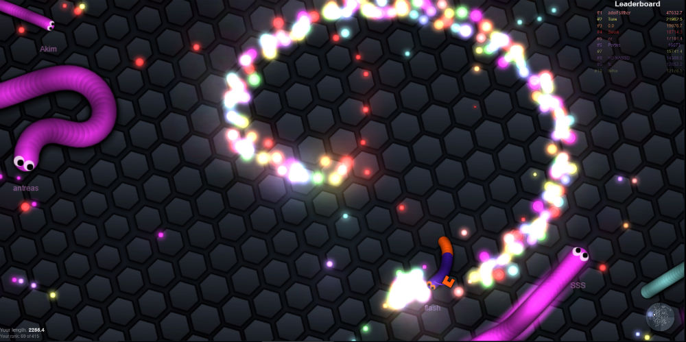 I died and became tens of light orbs! You can see other snakes speeding up to devour them.